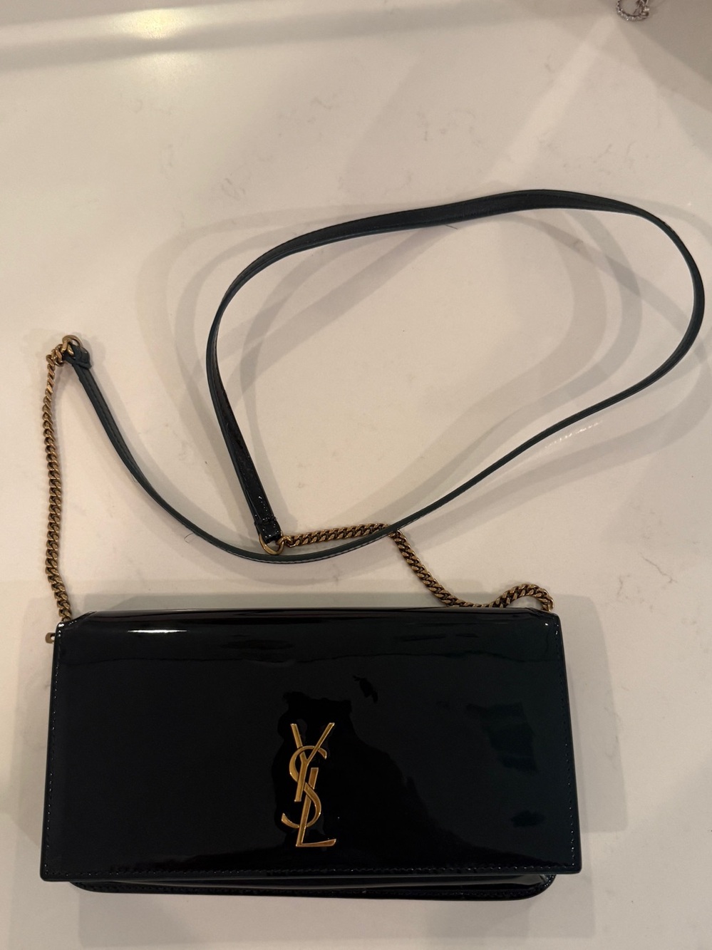 YSL SAINT LAURENT's 'Cassandre Strap' phone case Green patent